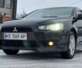 Черный Мицубиси Лансер, объемом двигателя 2 л и пробегом 280 тыс. км за 6800 $, фото 12 на Automoto.ua