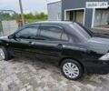 Чорний Міцубісі Lancer, об'ємом двигуна 1.6 л та пробігом 200 тис. км за 4900 $, фото 15 на Automoto.ua