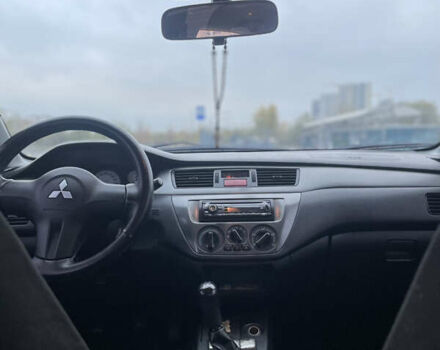 Міцубісі Lancer 2008 у Києві на Automoto.ua Чорний Міцубісі Lancer, об'ємом двигуна 1.58 л та пробігом 300 тис. км за 3800 $, фото 6 на Automoto.ua