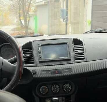 Чорний Міцубісі Lancer, об'ємом двигуна 1.5 л та пробігом 290 тис. км за 5499 $, фото 6 на Automoto.ua