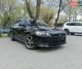 Черный Мицубиси Лансер, объемом двигателя 1.5 л и пробегом 237 тыс. км за 5200 $, фото 1 на Automoto.ua