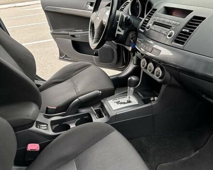 Чорний Міцубісі Lancer, об'ємом двигуна 2 л та пробігом 199 тис. км за 7900 $, фото 48 на Automoto.ua