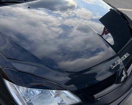 Чорний Міцубісі Lancer, об'ємом двигуна 1.6 л та пробігом 310 тис. км за 3500 $, фото 36 на Automoto.ua