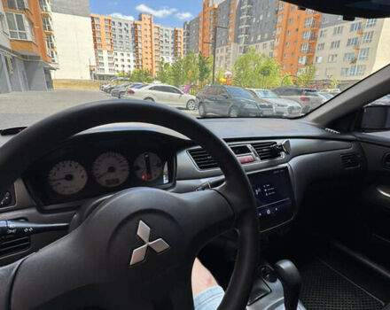 Черный Мицубиси Лансер, объемом двигателя 1.58 л и пробегом 163 тыс. км за 5699 $, фото 10 на Automoto.ua