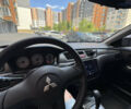 Черный Мицубиси Лансер, объемом двигателя 1.58 л и пробегом 163 тыс. км за 5699 $, фото 10 на Automoto.ua