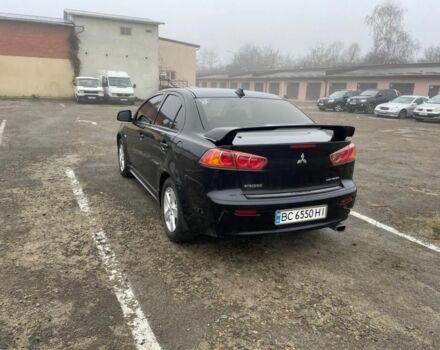 Чорний Міцубісі Lancer, об'ємом двигуна 2 л та пробігом 194 тис. км за 7300 $, фото 1 на Automoto.ua