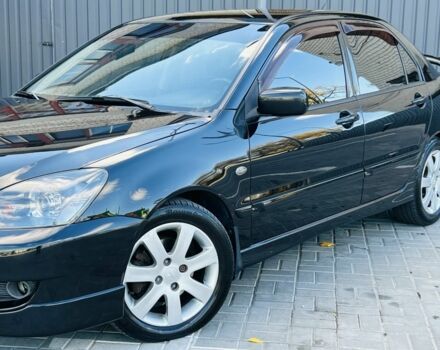 Міцубісі Lancer 2008 у Синельниковом на Automoto.ua Чорний Міцубісі Lancer, об'ємом двигуна 1.6 л та пробігом 230 тис. км за 4500 $, фото 3 на Automoto.ua