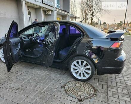 Чорний Міцубісі Lancer, об'ємом двигуна 2 л та пробігом 150 тис. км за 10500 $, фото 7 на Automoto.ua