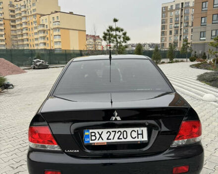 Черный Мицубиси Лансер, объемом двигателя 1.6 л и пробегом 240 тыс. км за 5200 $, фото 7 на Automoto.ua