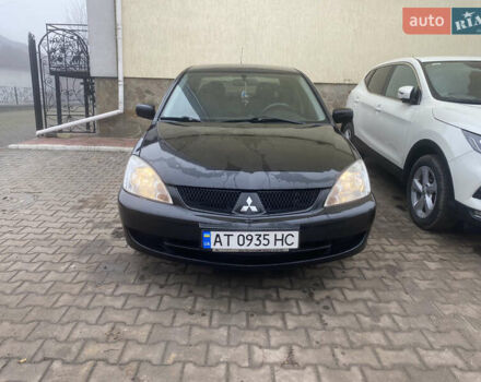 Черный Мицубиси Лансер, объемом двигателя 1.58 л и пробегом 211 тыс. км за 6333 $, фото 18 на Automoto.ua