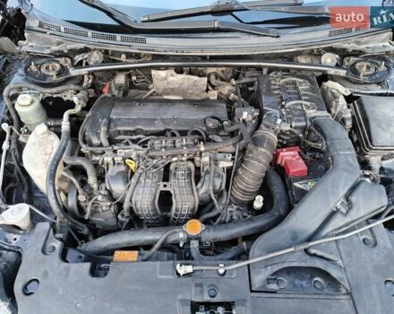 Черный Мицубиси Лансер, объемом двигателя 2 л и пробегом 245 тыс. км за 5600 $, фото 12 на Automoto.ua