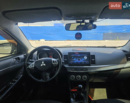 Чорний Міцубісі Lancer, об'ємом двигуна 2 л та пробігом 249 тис. км за 6500 $, фото 13 на Automoto.ua