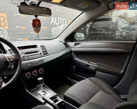 Чорний Міцубісі Lancer, об'ємом двигуна 2 л та пробігом 118 тис. км за 6200 $, фото 12 на Automoto.ua
