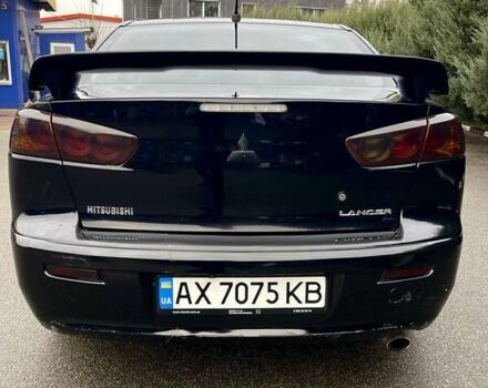 Чорний Міцубісі Lancer, об'ємом двигуна 2 л та пробігом 217 тис. км за 5800 $, фото 8 на Automoto.ua