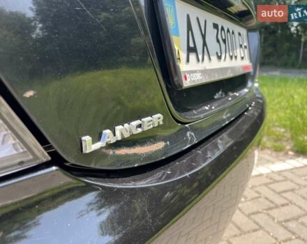 Чорний Міцубісі Lancer, об'ємом двигуна 1.6 л та пробігом 296 тис. км за 4200 $, фото 23 на Automoto.ua