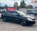 Мицубиси Лансер 2008 в Запорожье на Automoto.ua Черный Мицубиси Лансер, объемом двигателя 1.6 л и пробегом 316 тыс. км за 4290 $, фото 7 на Automoto.ua