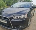Чорний Міцубісі Lancer, об'ємом двигуна 2 л та пробігом 281 тис. км за 5512 $, фото 1 на Automoto.ua