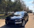 Чорний Міцубісі Lancer, об'ємом двигуна 2 л та пробігом 260 тис. км за 6900 $, фото 1 на Automoto.ua