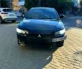 Чорний Міцубісі Lancer, об'ємом двигуна 2 л та пробігом 230 тис. км за 5500 $, фото 1 на Automoto.ua