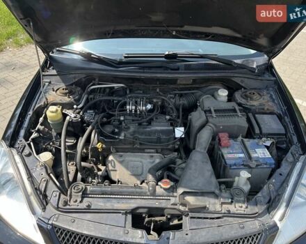 Чорний Міцубісі Lancer, об'ємом двигуна 1.6 л та пробігом 296 тис. км за 4200 $, фото 8 на Automoto.ua