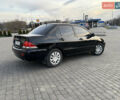 Чорний Міцубісі Lancer, об'ємом двигуна 1.58 л та пробігом 344 тис. км за 3999 $, фото 1 на Automoto.ua