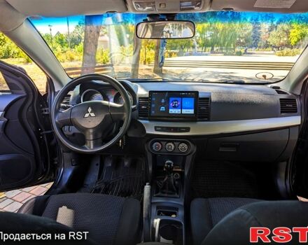 Черный Мицубиси Лансер, объемом двигателя 1.5 л и пробегом 235 тыс. км за 5250 $, фото 9 на Automoto.ua