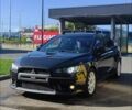 Чорний Міцубісі Lancer, об'ємом двигуна 2 л та пробігом 134 тис. км за 29034 $, фото 7 на Automoto.ua
