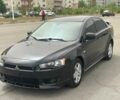 Чорний Міцубісі Lancer, об'ємом двигуна 0 л та пробігом 210 тис. км за 6799 $, фото 1 на Automoto.ua