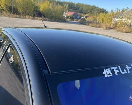 Чорний Міцубісі Lancer, об'ємом двигуна 2 л та пробігом 223 тис. км за 7800 $, фото 5 на Automoto.ua