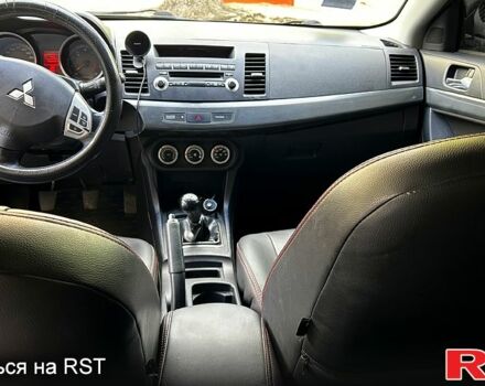 Мицубиси Лансер 2008 в Полтаве на Automoto.ua Черный Мицубиси Лансер, объемом двигателя 2 л и пробегом 284 тыс. км за 6300 $, фото 8 на Automoto.ua