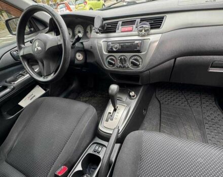 Чорний Міцубісі Lancer, об'ємом двигуна 1.6 л та пробігом 245 тис. км за 4500 $, фото 21 на Automoto.ua
