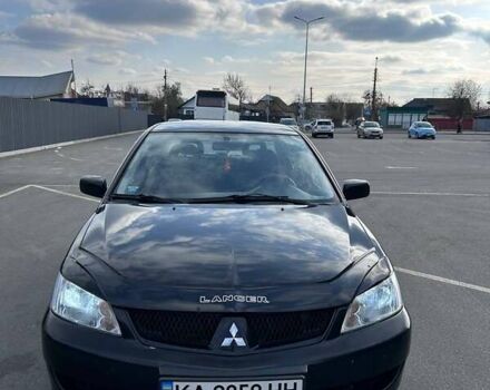 Чорний Міцубісі Lancer, об'ємом двигуна 1.6 л та пробігом 310 тис. км за 3500 $, фото 27 на Automoto.ua