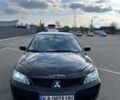 Чорний Міцубісі Lancer, об'ємом двигуна 1.6 л та пробігом 310 тис. км за 3500 $, фото 27 на Automoto.ua