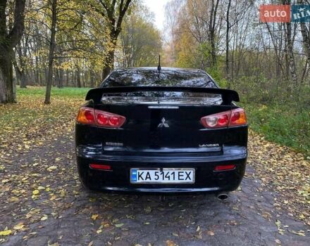 Чорний Міцубісі Lancer, об'ємом двигуна 2 л та пробігом 237 тис. км за 7500 $, фото 6 на Automoto.ua