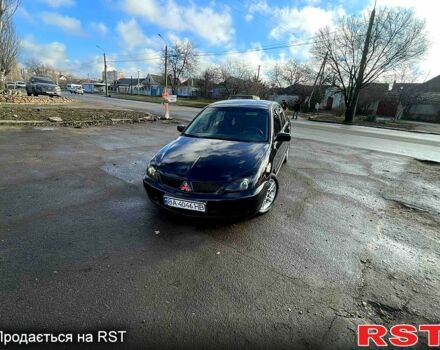 Чорний Міцубісі Lancer, об'ємом двигуна 2 л та пробігом 1 тис. км за 4600 $, фото 7 на Automoto.ua