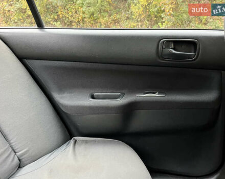 Чорний Міцубісі Lancer, об'ємом двигуна 1.58 л та пробігом 192 тис. км за 4500 $, фото 16 на Automoto.ua