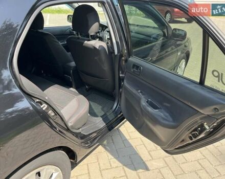 Чорний Міцубісі Lancer, об'ємом двигуна 1.6 л та пробігом 296 тис. км за 4200 $, фото 42 на Automoto.ua