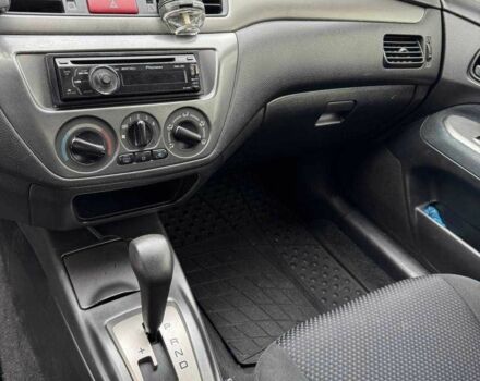 Чорний Міцубісі Lancer, об'ємом двигуна 1.6 л та пробігом 245 тис. км за 4500 $, фото 16 на Automoto.ua