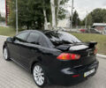 Чорний Міцубісі Lancer, об'ємом двигуна 2 л та пробігом 200 тис. км за 6800 $, фото 3 на Automoto.ua