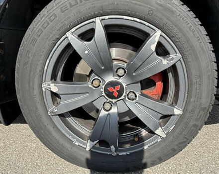 Черный Мицубиси Лансер, объемом двигателя 1.6 л и пробегом 321 тыс. км за 5000 $, фото 18 на Automoto.ua