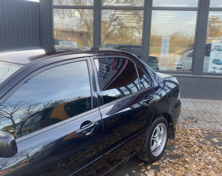 Мицубиси Лансер 2008 в Киеве на Automoto.ua Черный Мицубиси Лансер, объемом двигателя 1.6 л и пробегом 72 тыс. км за 2650 $, фото 3 на Automoto.ua