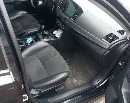 Чорний Міцубісі Lancer, об'ємом двигуна 2 л та пробігом 232 тис. км за 5000 $, фото 2 на Automoto.ua