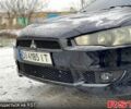 Черный Мицубиси Лансер, объемом двигателя 2 л и пробегом 246 тыс. км за 6200 $, фото 10 на Automoto.ua