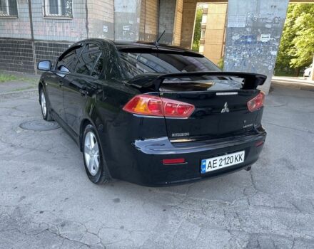 Чорний Міцубісі Lancer, об'ємом двигуна 2 л та пробігом 215 тис. км за 7700 $, фото 4 на Automoto.ua