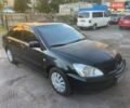 Чорний Міцубісі Lancer, об'ємом двигуна 1.58 л та пробігом 300 тис. км за 2600 $, фото 1 на Automoto.ua