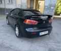 Чорний Міцубісі Lancer, об'ємом двигуна 2 л та пробігом 215 тис. км за 7700 $, фото 4 на Automoto.ua