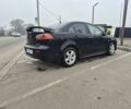 Чорний Міцубісі Lancer, об'ємом двигуна 0 л та пробігом 276 тис. км за 5750 $, фото 5 на Automoto.ua