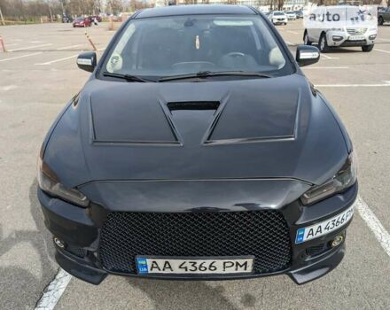 Черный Мицубиси Лансер, объемом двигателя 2 л и пробегом 240 тыс. км за 10000 $, фото 9 на Automoto.ua