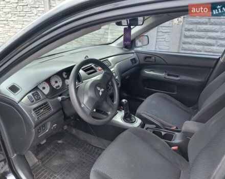 Чорний Міцубісі Lancer, об'ємом двигуна 1.6 л та пробігом 215 тис. км за 4900 $, фото 9 на Automoto.ua