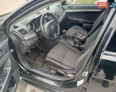 Черный Мицубиси Лансер, объемом двигателя 1.5 л и пробегом 253 тыс. км за 5500 $, фото 9 на Automoto.ua